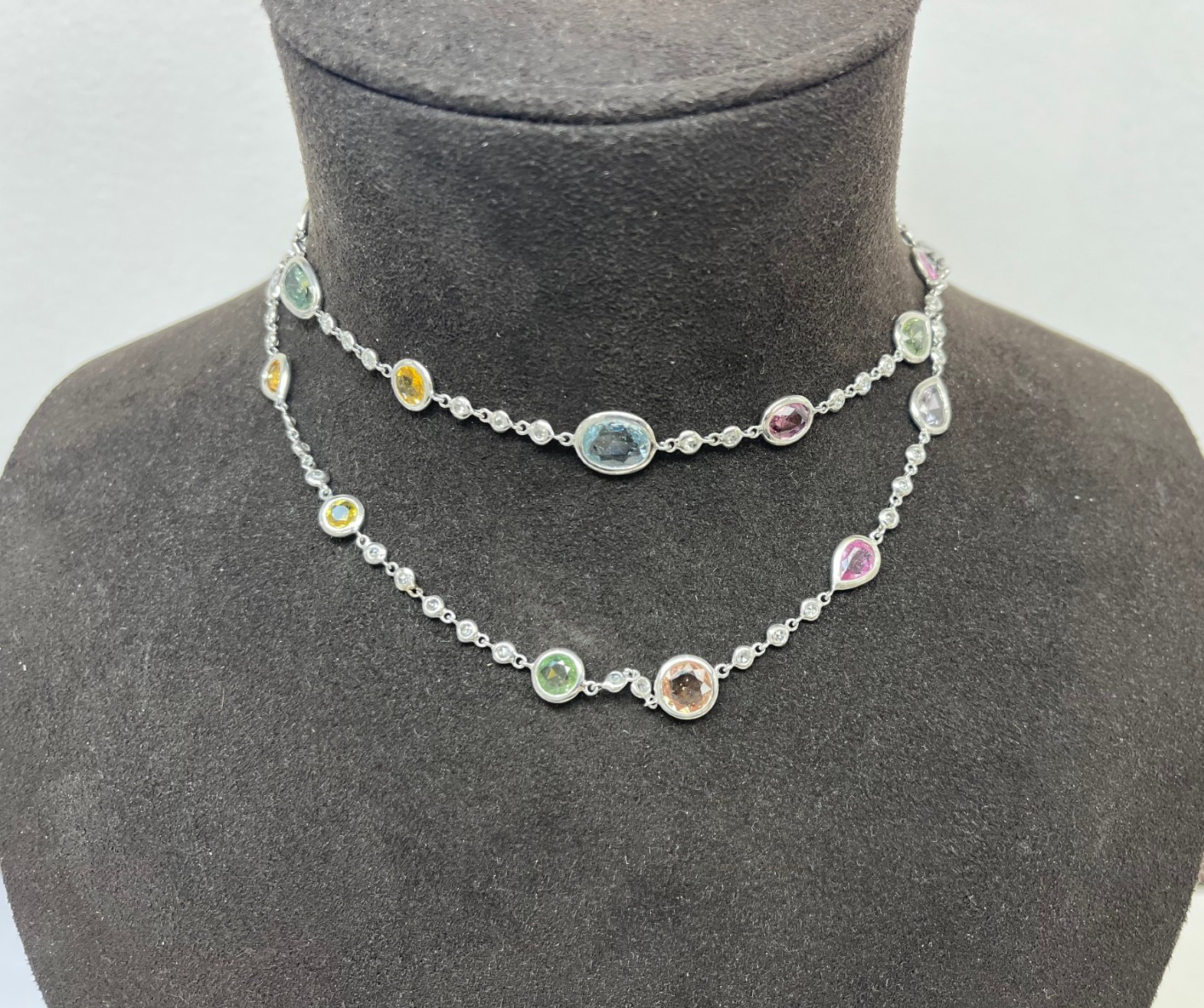An Elegant White Gold Blue Sapphire and Diamond By-the-Yard Necklace