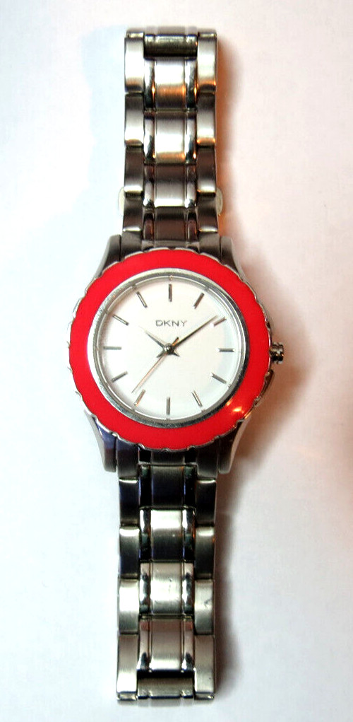 NICE WOMENS DKNY QUARTZ SPORT 5 ATM PINK BEZEL WATCH FRESH BATTERY RUN’S,