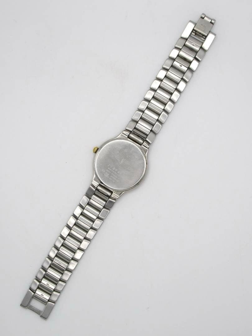 Yves Saint Laurent watch 4620-E66661Y, black dial, working condition.