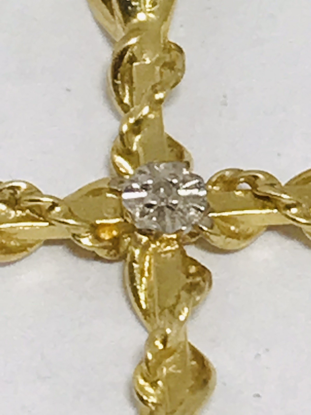 14K Yellow Gold Cross Pendant And White Gold Accent Diamond Chip Accented Center