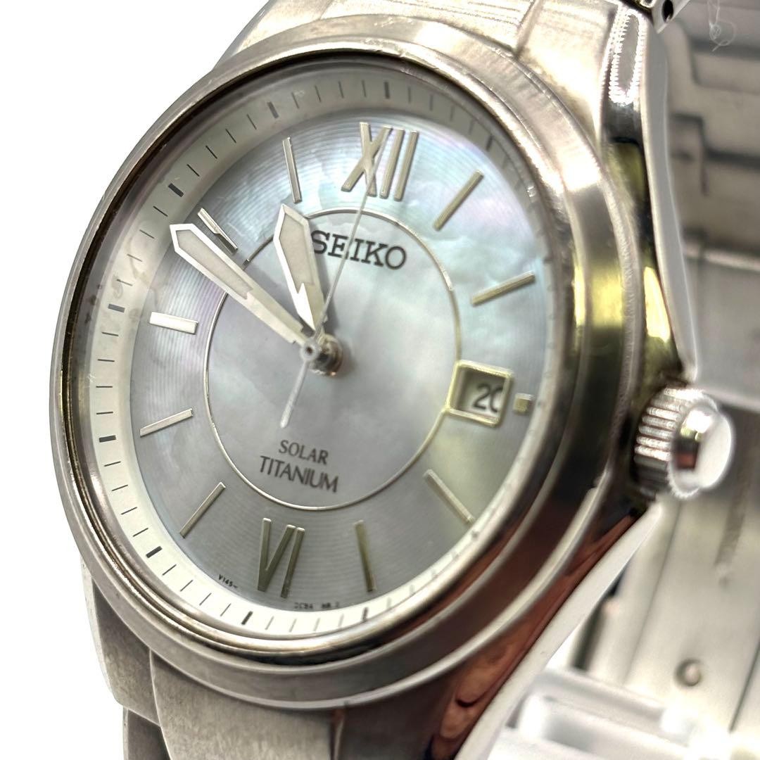 Working ,SEIKO solar-powered titanium watch with mother-of-pearl dial,From Japan