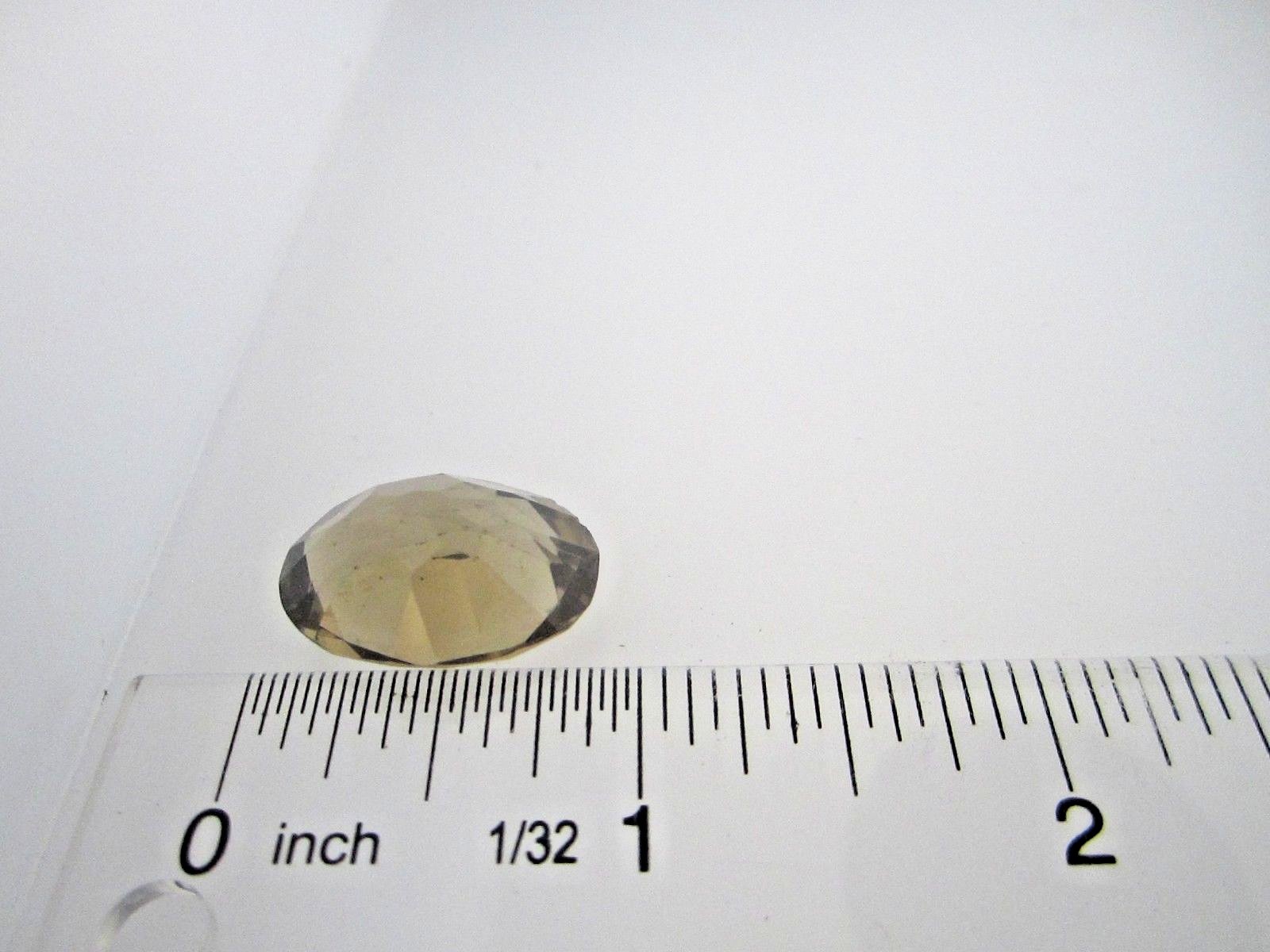 20.8 Carat 21.5MM X 16MM oval cut Smokey Topaz Stone