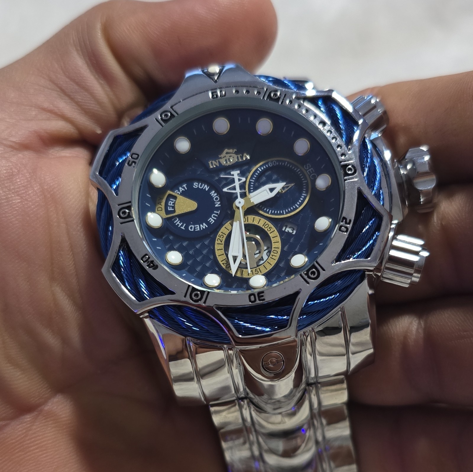 Invicta men’s watch, blue dial and silver bracelet. Not original but very nice s