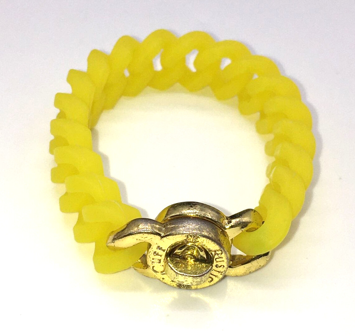 Rustic Cuff Gold Tone Logo Turn Lock Yellow Silicone Stretch Bracelet