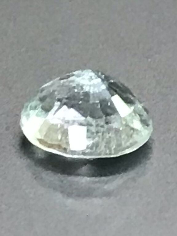 0.74 Ct 6.16×5.14×3.66mm Copper Bi-Color Paraiba Tourmaline Certified