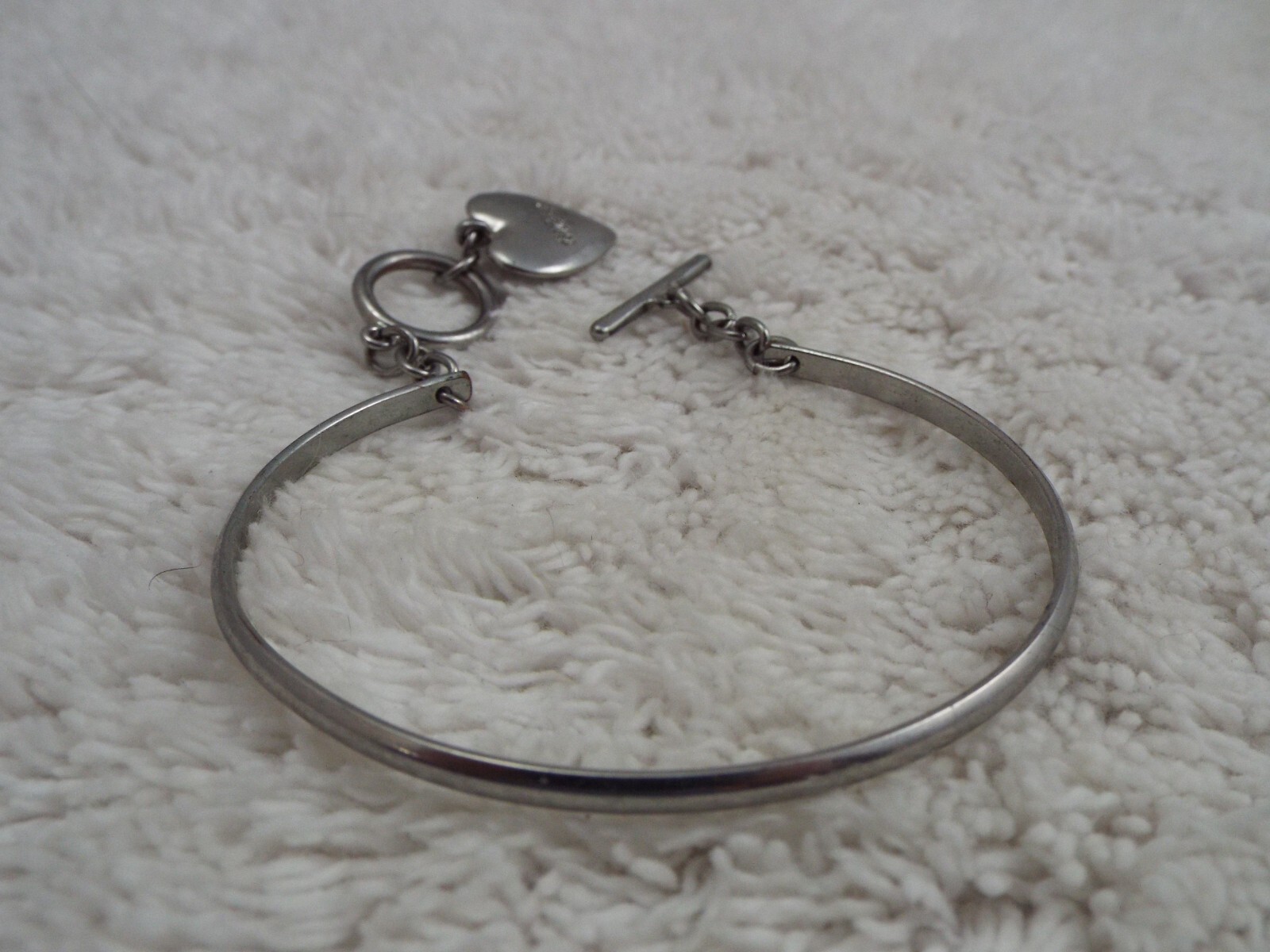 GUESS Silvertone Heart Charm Cuff Bracelet
