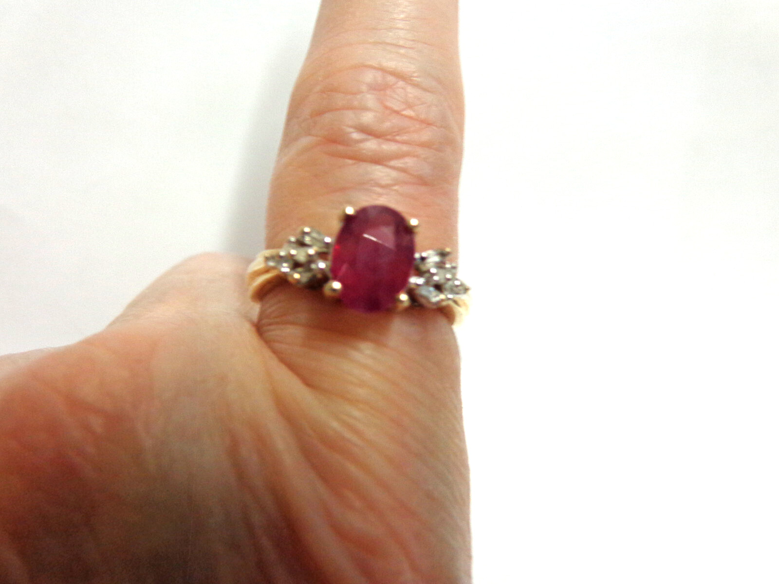 10kt yellow gold ruby/diamond ring sz 7 wgt 2.4 grams tcw 1.12 solitaire/accents