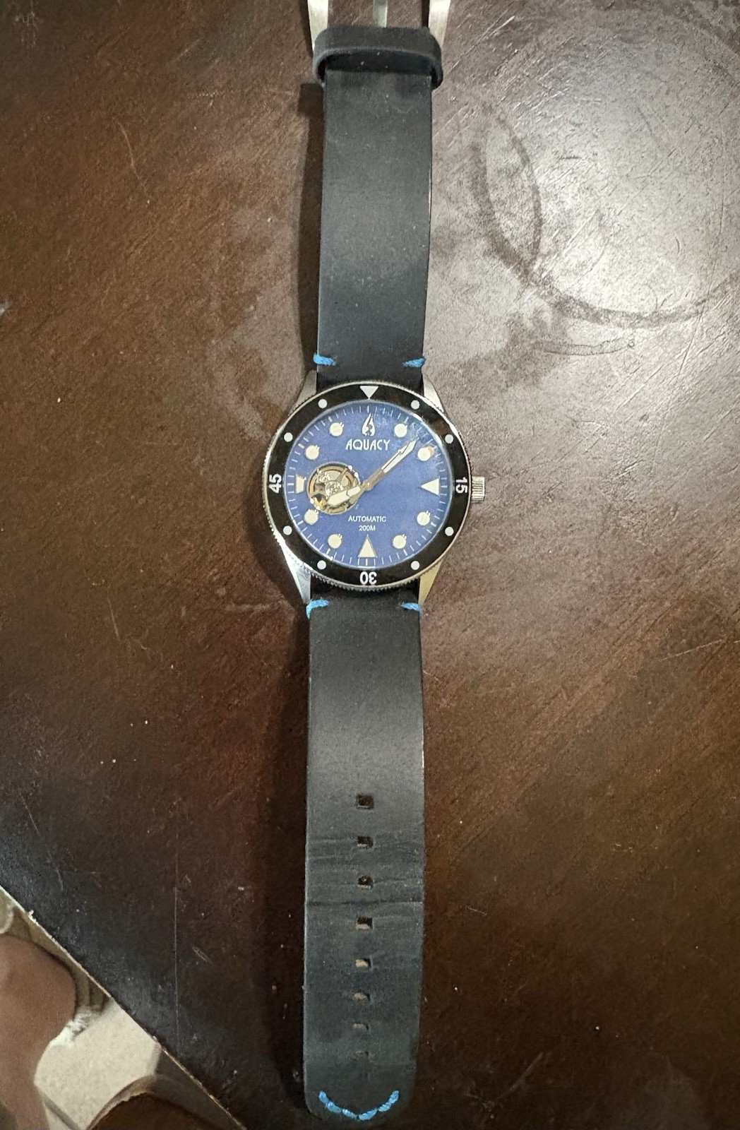 Aquacy Men’s Hei Matau Cave Diver Open Heart Blue MOP Automatic 42mm Watch