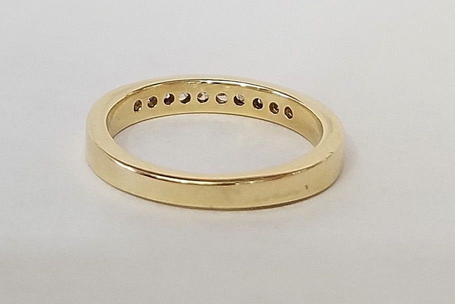 14K YELLOW GOLD 1/4 CARAT CHANNEL SET DIAMOND BAND / RING