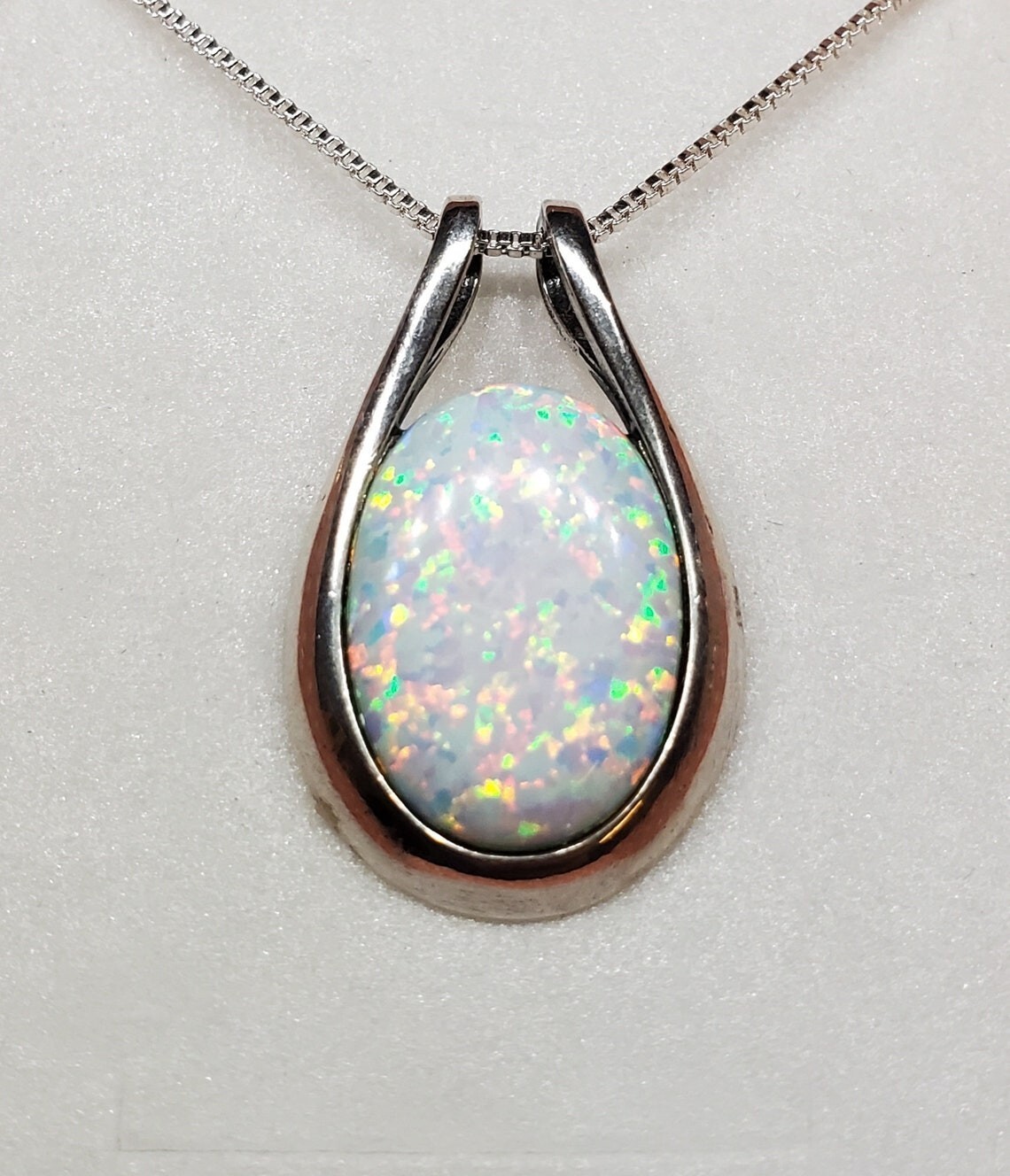 2.0Ct Oval Cut Lab Created Fire Opal Bezel Set Women’s Silver Pendant 18″ Chain