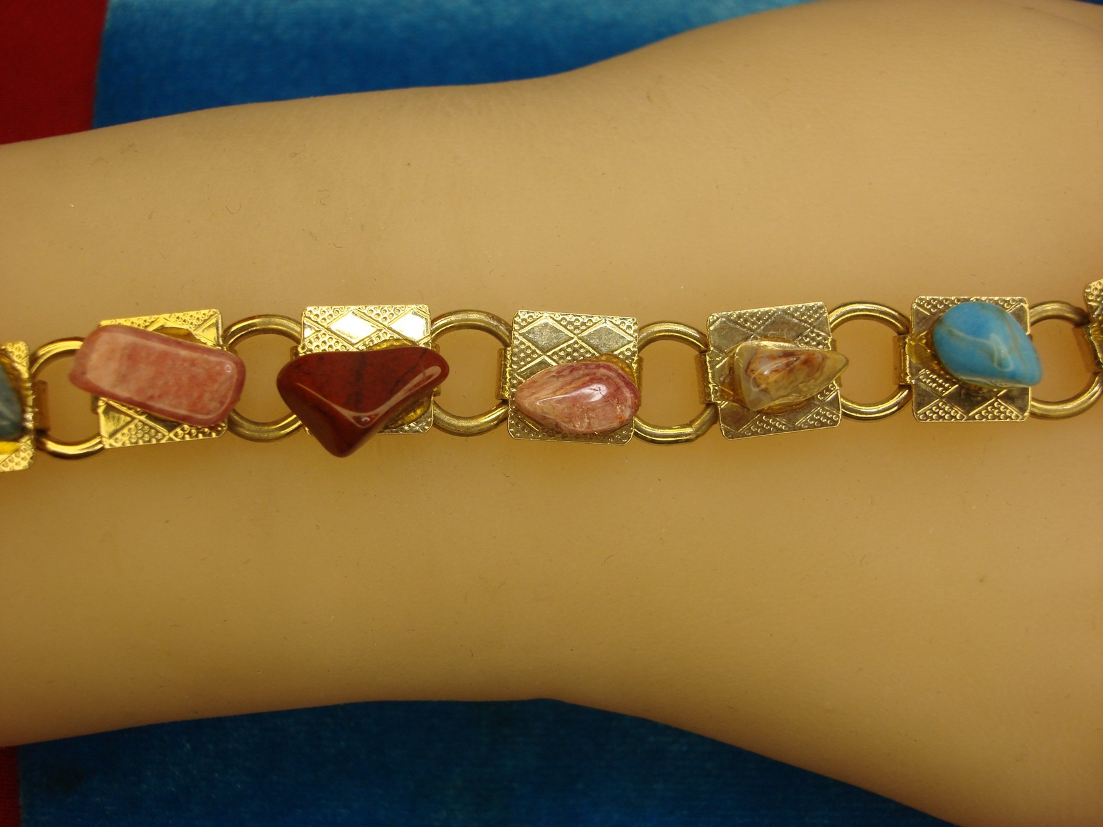 GOLD TONE BRACELET WITH 11 DIFF. NATURAL GEMSTONES – 7″ – PRETTY