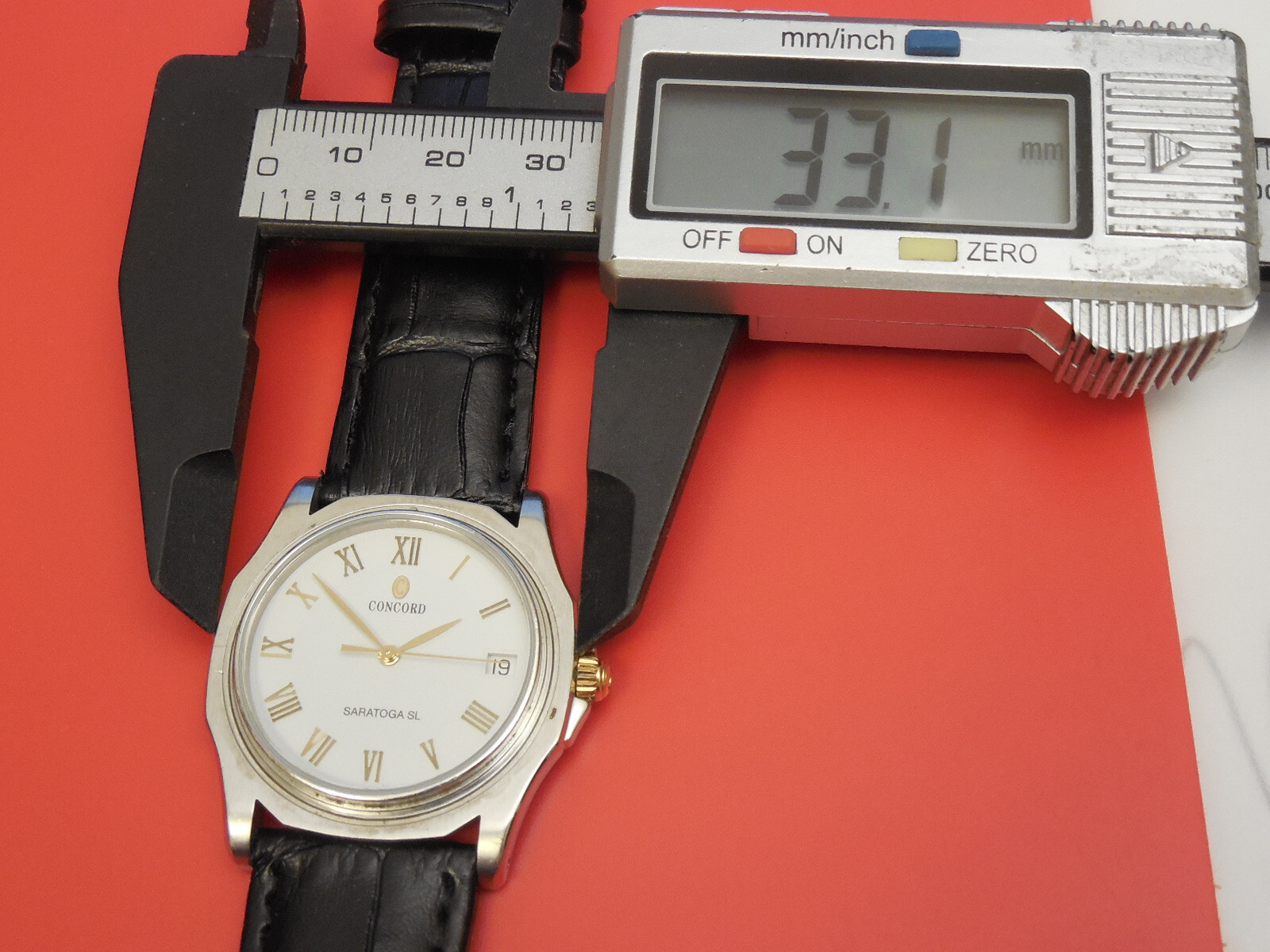 CONCORD SOLD STAINLESS STEEL 34MM SARATOGA DATE MEN’S WATCH MISSING BEZEL
