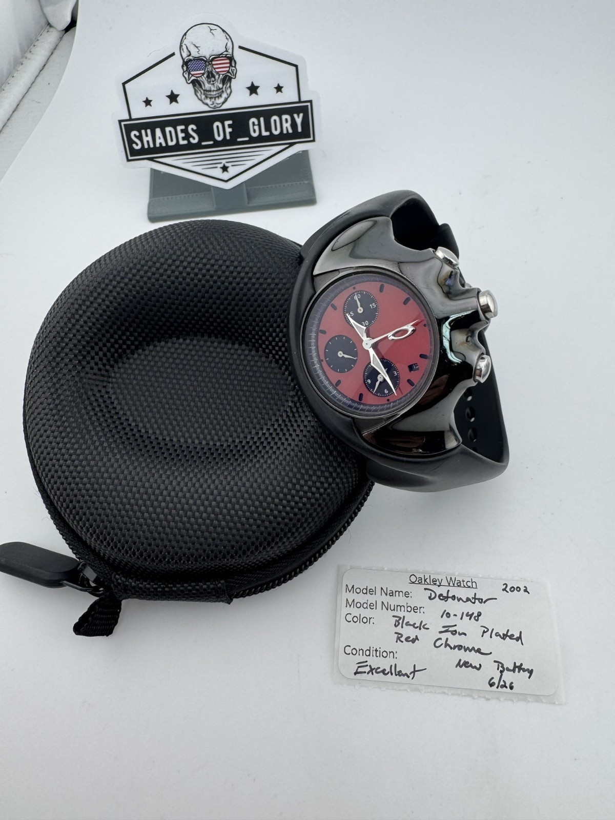 OAKLEY DETONATOR WATCH BLACK ION PLATED W/ RED CHROME DIAL RUBBER STRAP 10-148