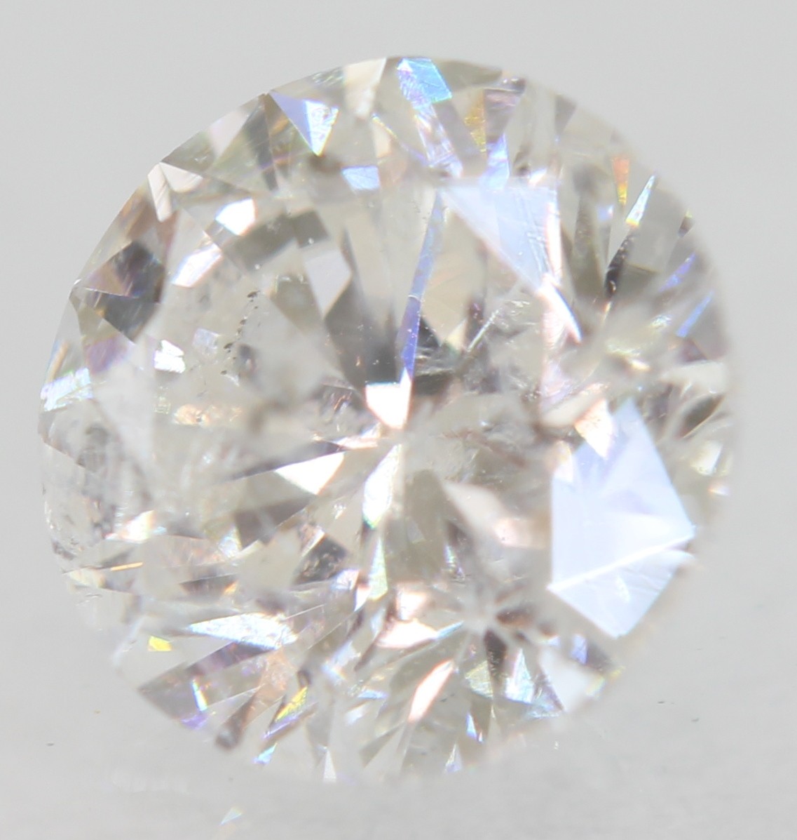 Certified 0.62 Carat E SI2 Round Brilliant Natural Enhanced Loose Diamond 5.32mm