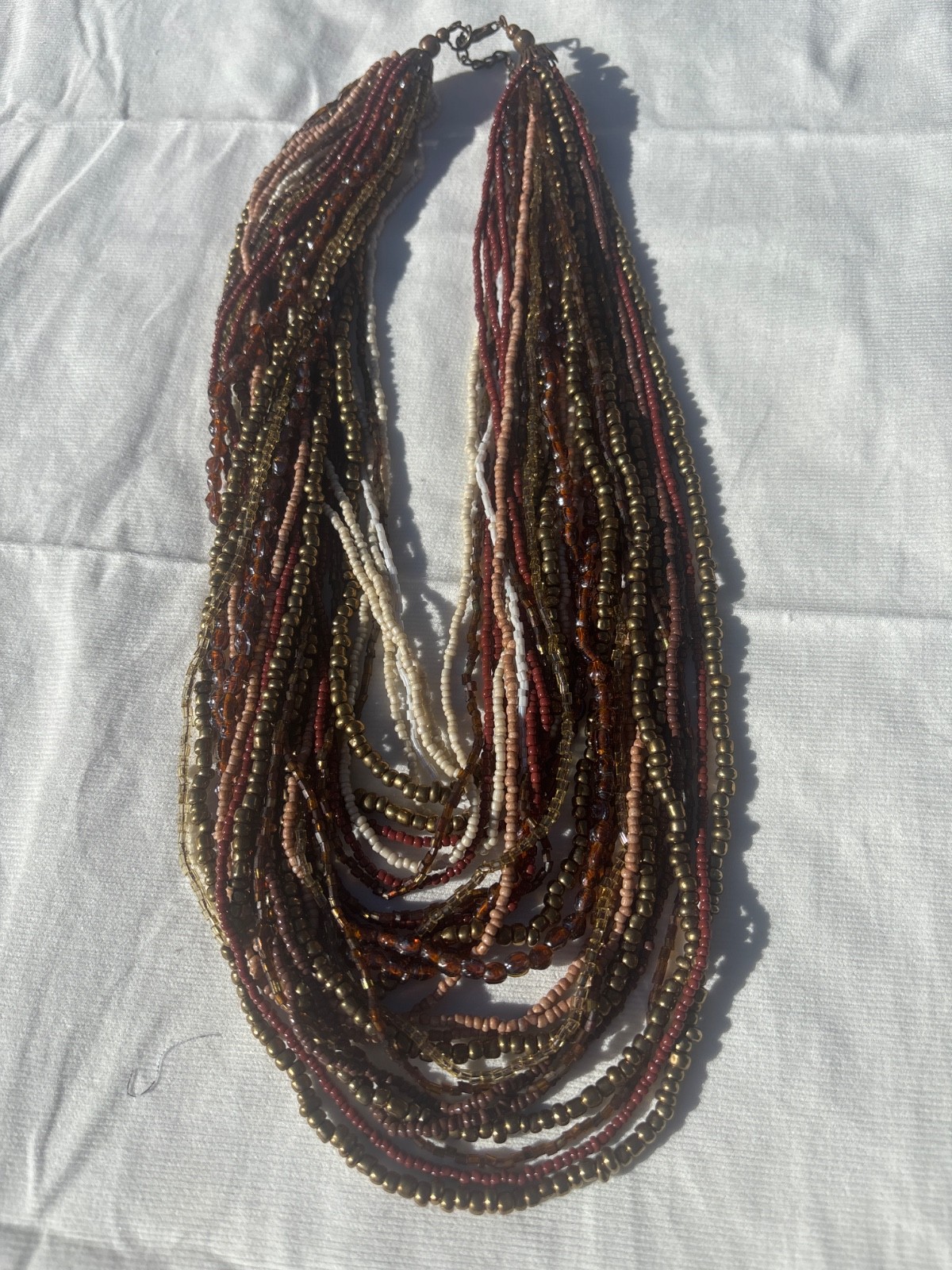 Multi strand necklace /women /glass/ fall colors/size 19”-24”/worn once/ lovingl