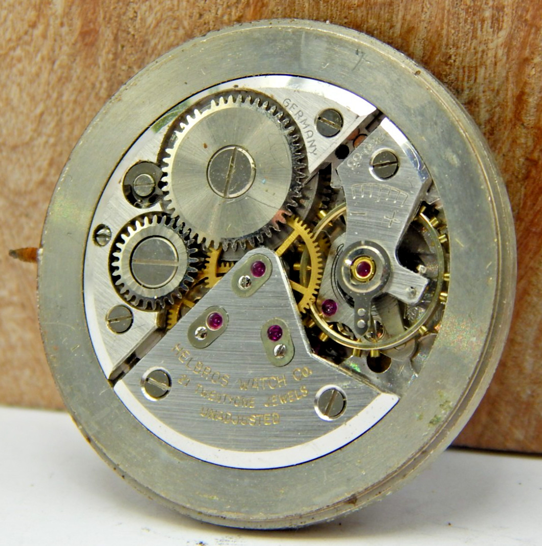 Vintage Helbros P50-65 21 Jewel men’s wrist watch movement with dial and hands