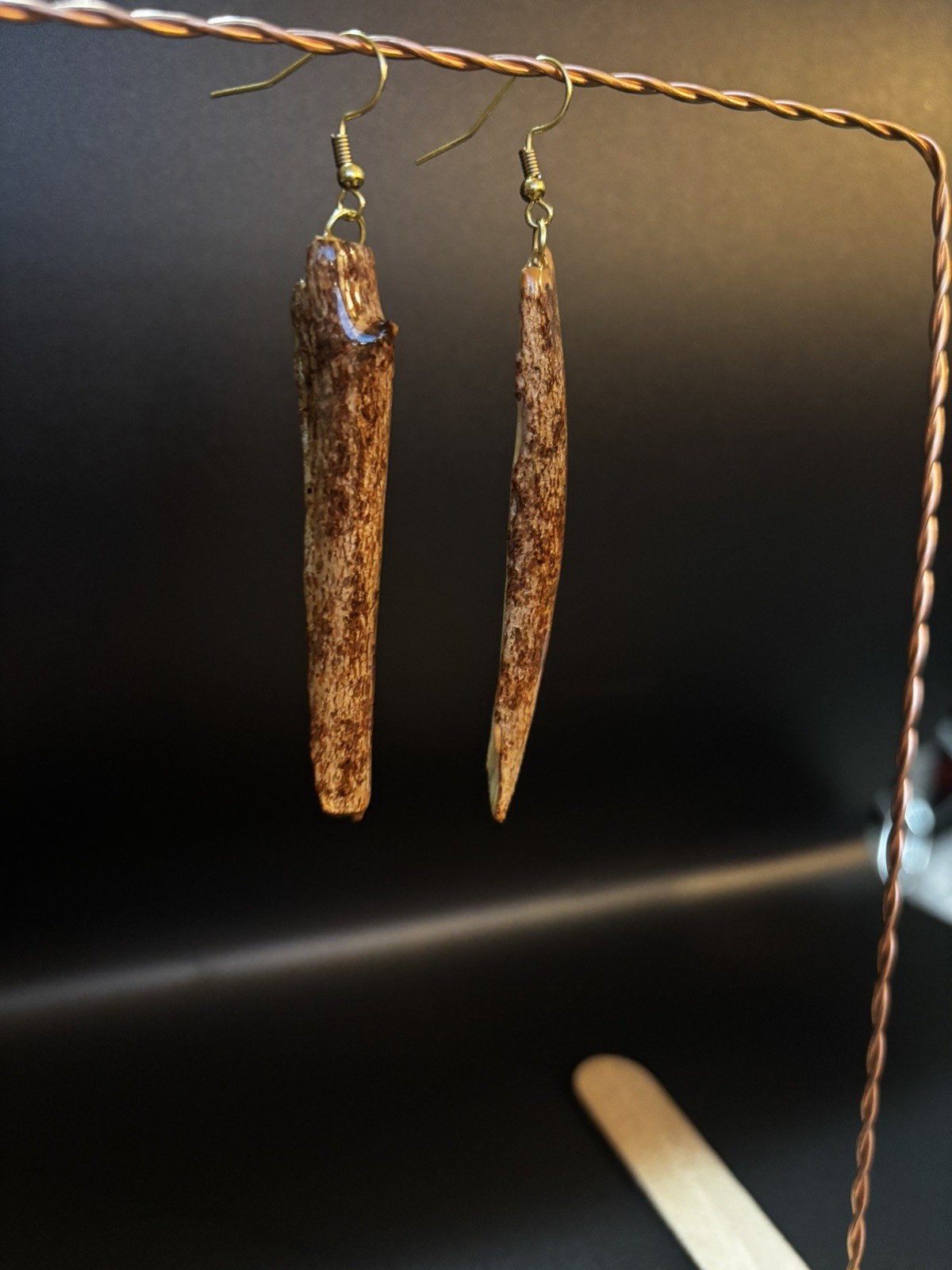 One of a kind jewelry made from real pieces of wood coated in resin