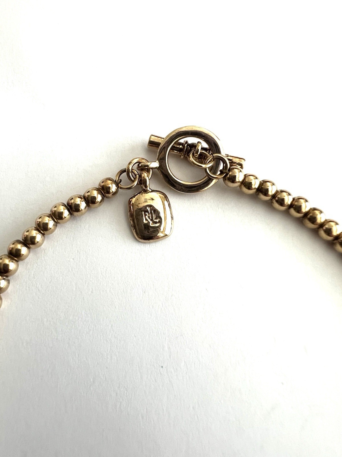 PREOWNED Vintage Polo Lauren Ralph Gold-Tone Logo Beaded Collar Necklace