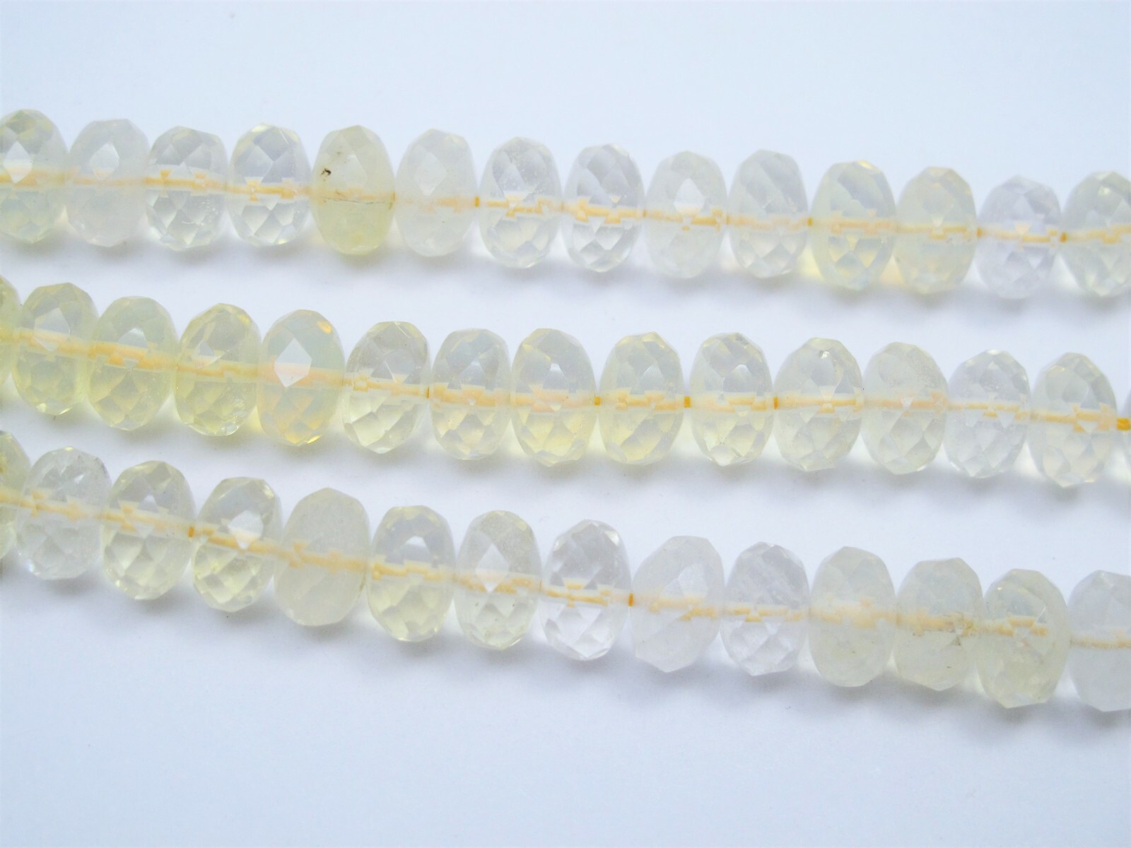 Pineapple quartz faceted roundell beads. 8mm,10mm Light yellow quartz beads.