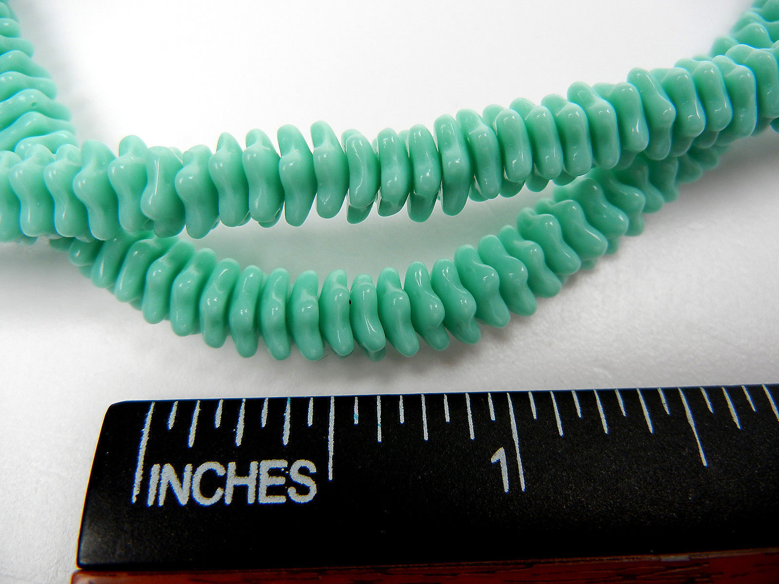 192 Czech glass flat flower star bead cups 7x3mm Opaque Green, 16 inch strand