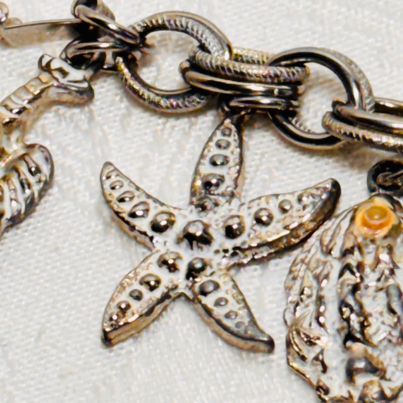 BRACELET ocean life charms starfish shells fish lobster fold over clasp vintage