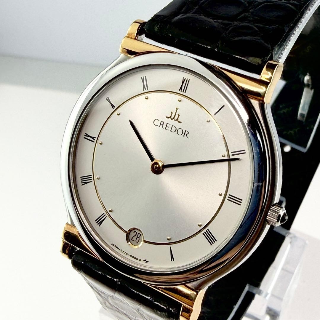 Seiko Credor 7779-6000 18K Gold SS Combi Roman Date Quartz Watch