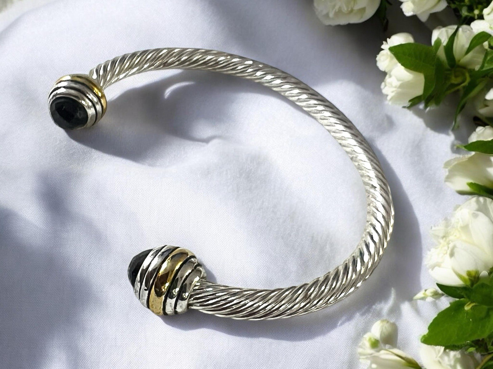 Silver Tone Twisted Open Cuff Bracelet with Black Faceted Stone Ends