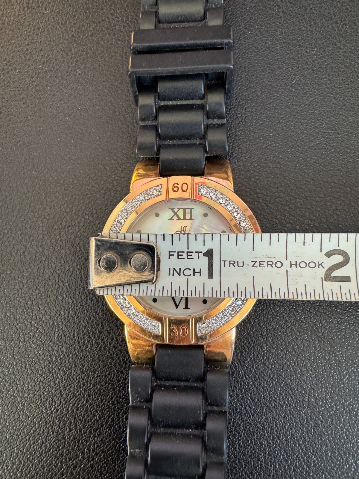 Daisy Fuentes Rhinestone Watch MOP Dial Black Strap Women’s Japan Movement