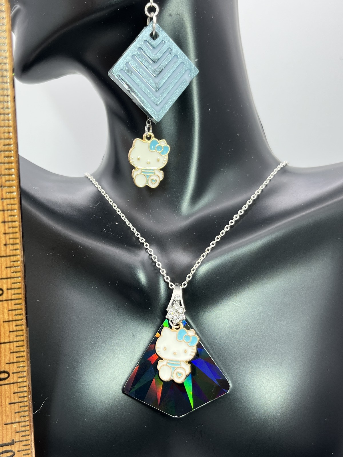 Earring & necklace w/ holographic black hello Kitty blue on silver or gold chain
