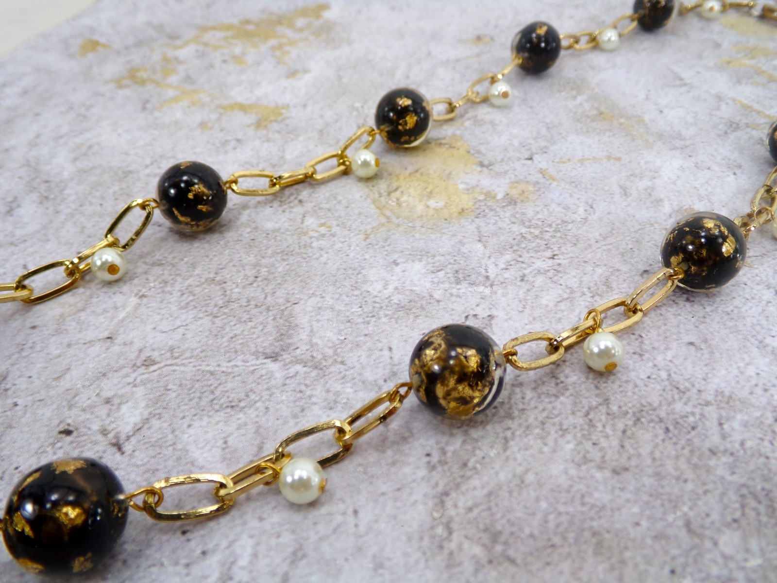 Black and gold leaf bead necklace with white pearls and gold link chain New