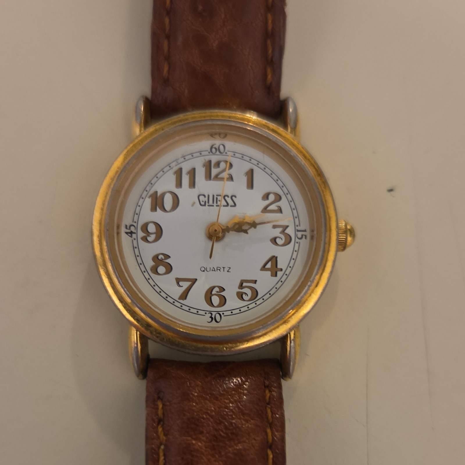 GUESS Women’s Quartz Analog Gold Tone Round Watch White Dial Brown Leather