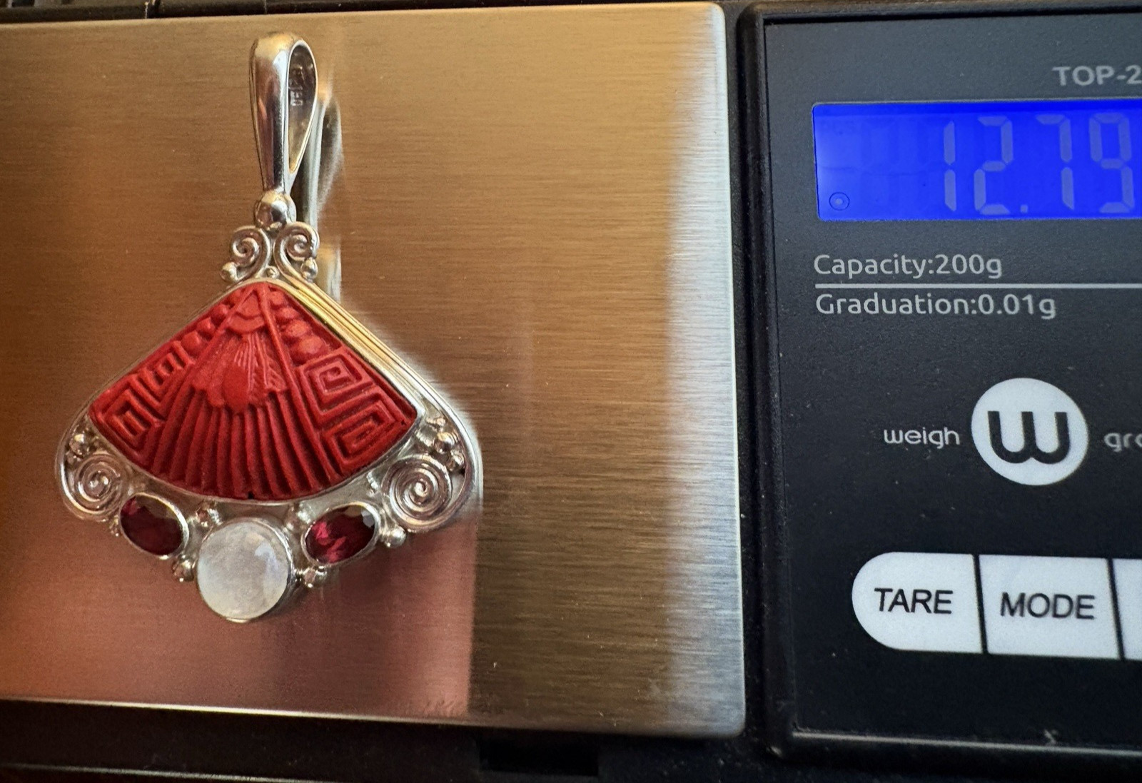 Sajen Sterling Silver Carved Cinnabar Fan Pendant with Moonstone & Garnet