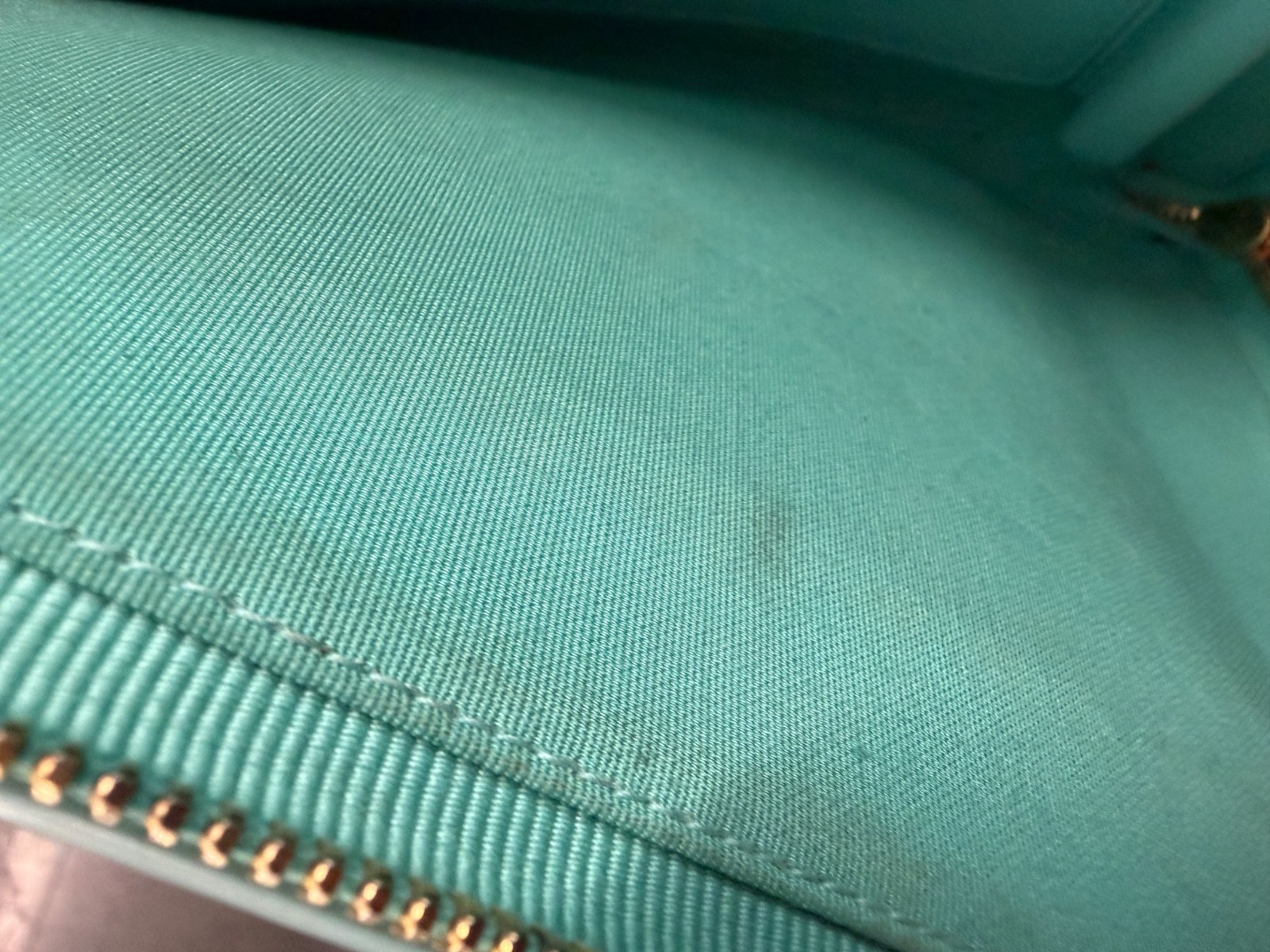 Tiffany & Co. Embossed Logo clutch