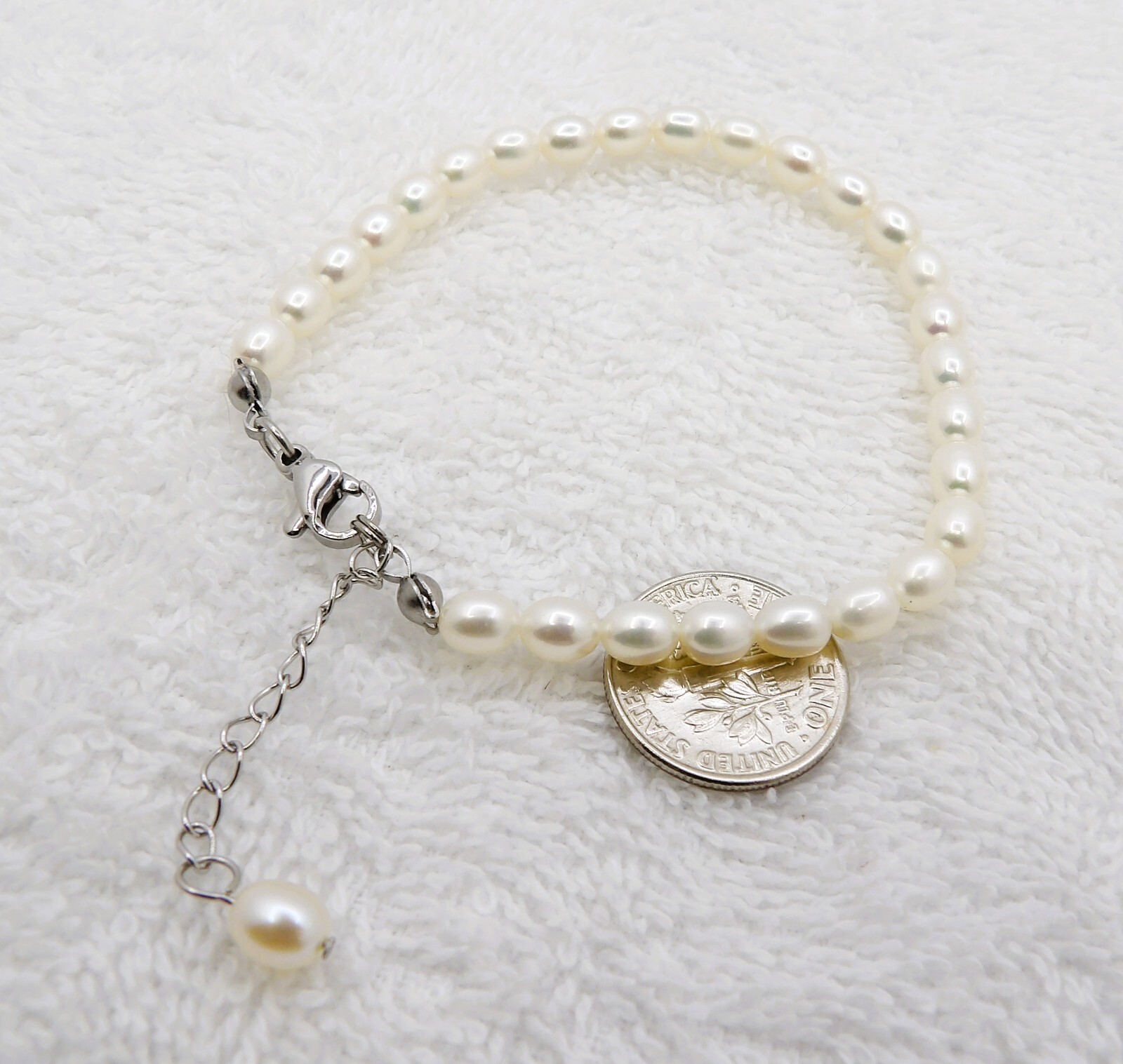 7 inches long Quality White Oval Rice Genuine Freshwater Pearl Bracelet BR10