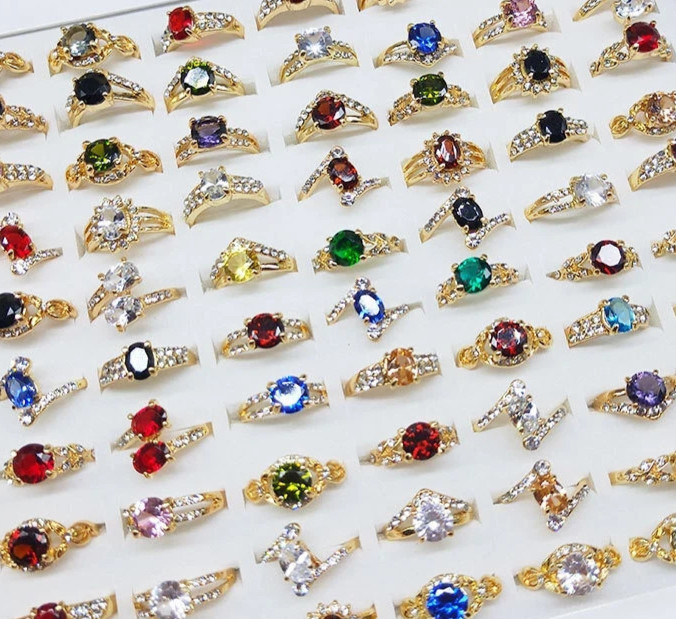 Treasure Bag of 10 Diff. Fashion Rings Including Sterling Silver (WOW)