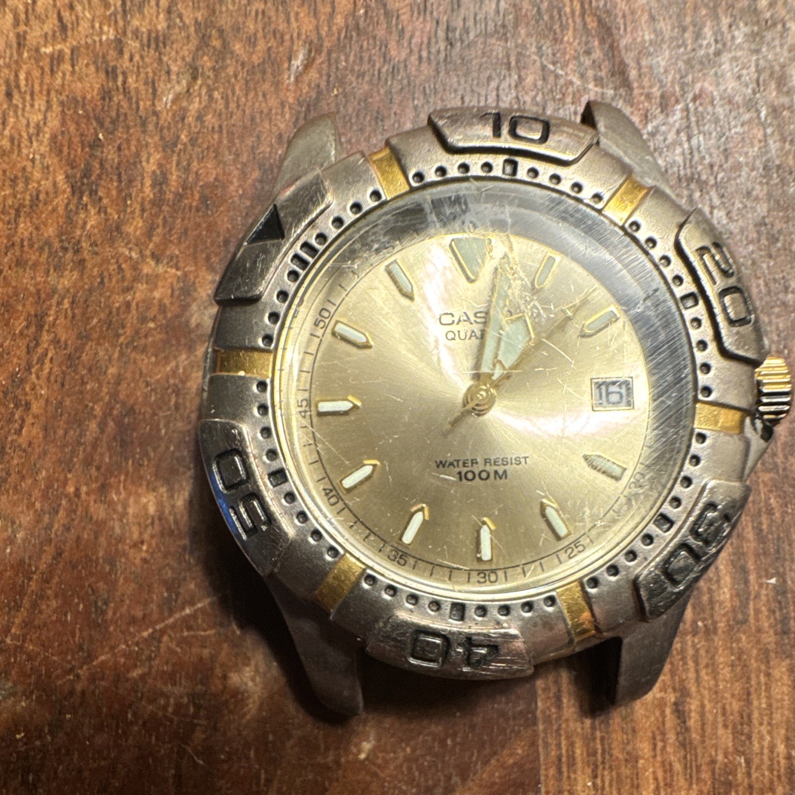 Casio Quartz Analog Date 100M Gold Dial Two-Tone Stick Round Watch Head Only