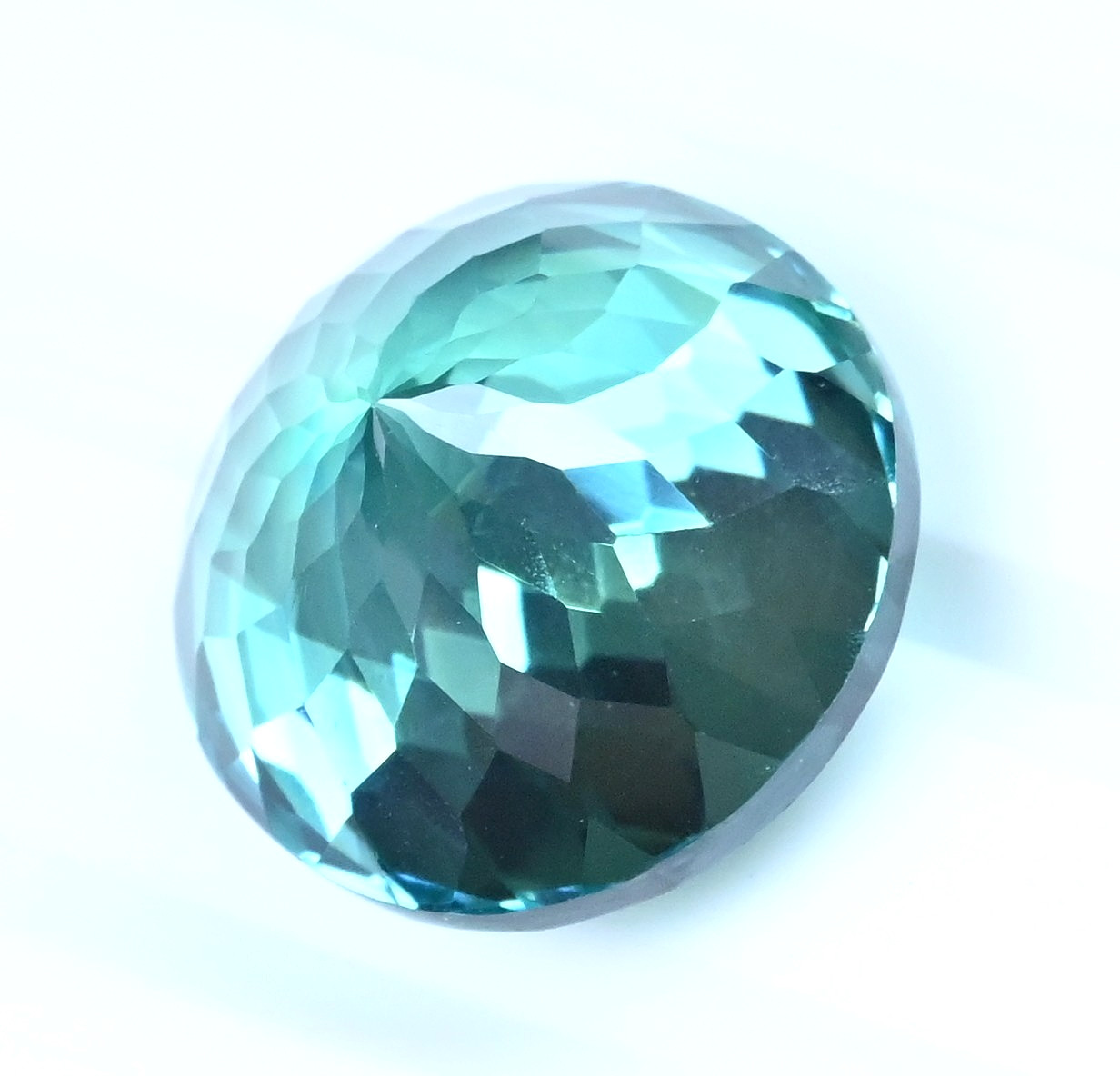 26.75 Ct Natural Green-Blue Serendibite Certified Flawless Round Loose Gemstone