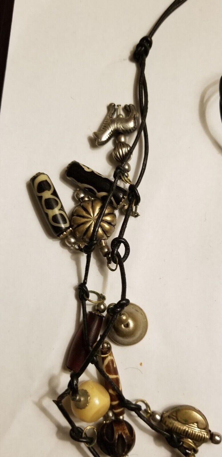 VINTAGE MOROCCAN ANIMAL CHARM NECKLACE LEATHER CORD SUSAN CUMMINGS STYLE