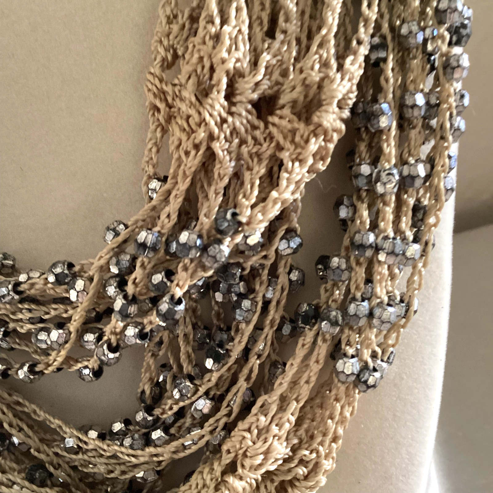 Tan crocheted necklace with silver beads, adjustable, 32 in. long