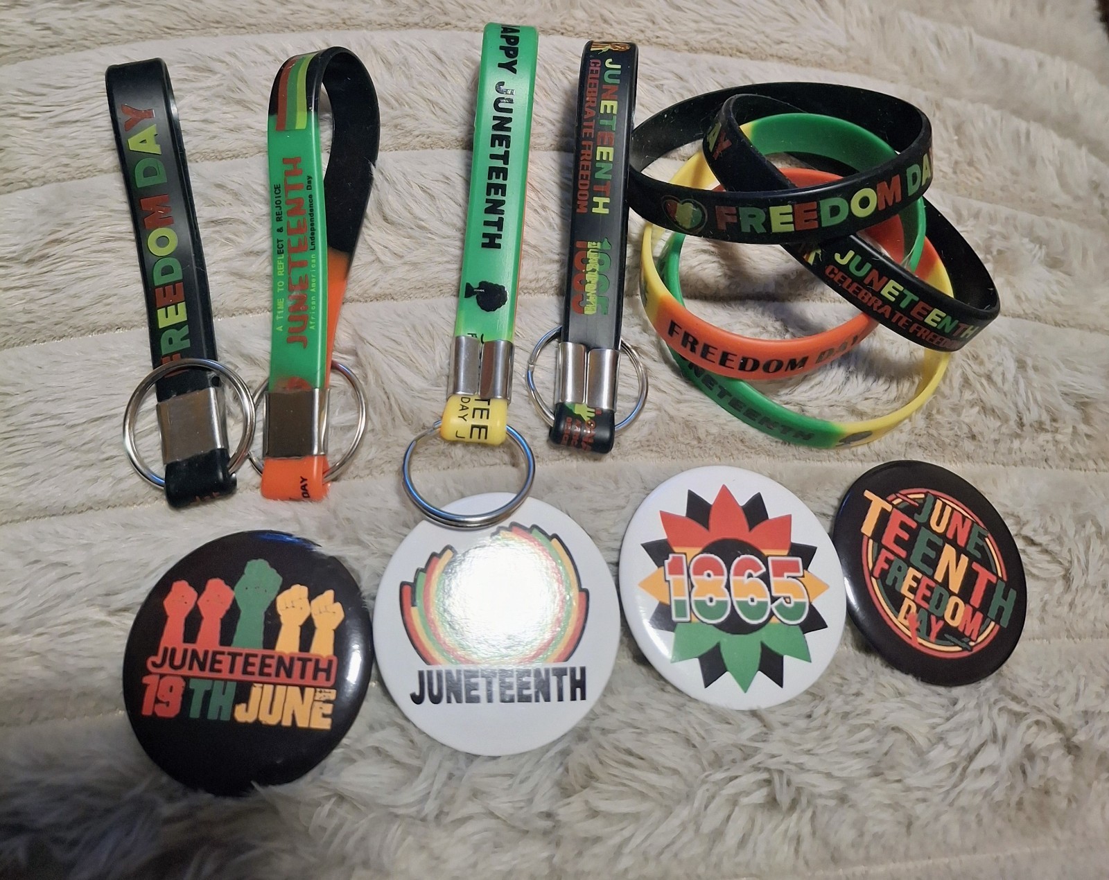 Juneteenth Celebration – Pins, Bracelet and Key Rings. 12 Items.