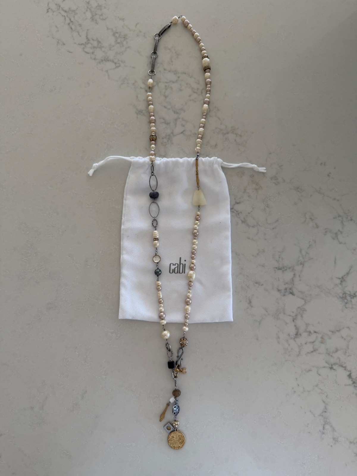 Cabi Teasure Necklace. Mixed Pearls, Charms, and Gold Silver