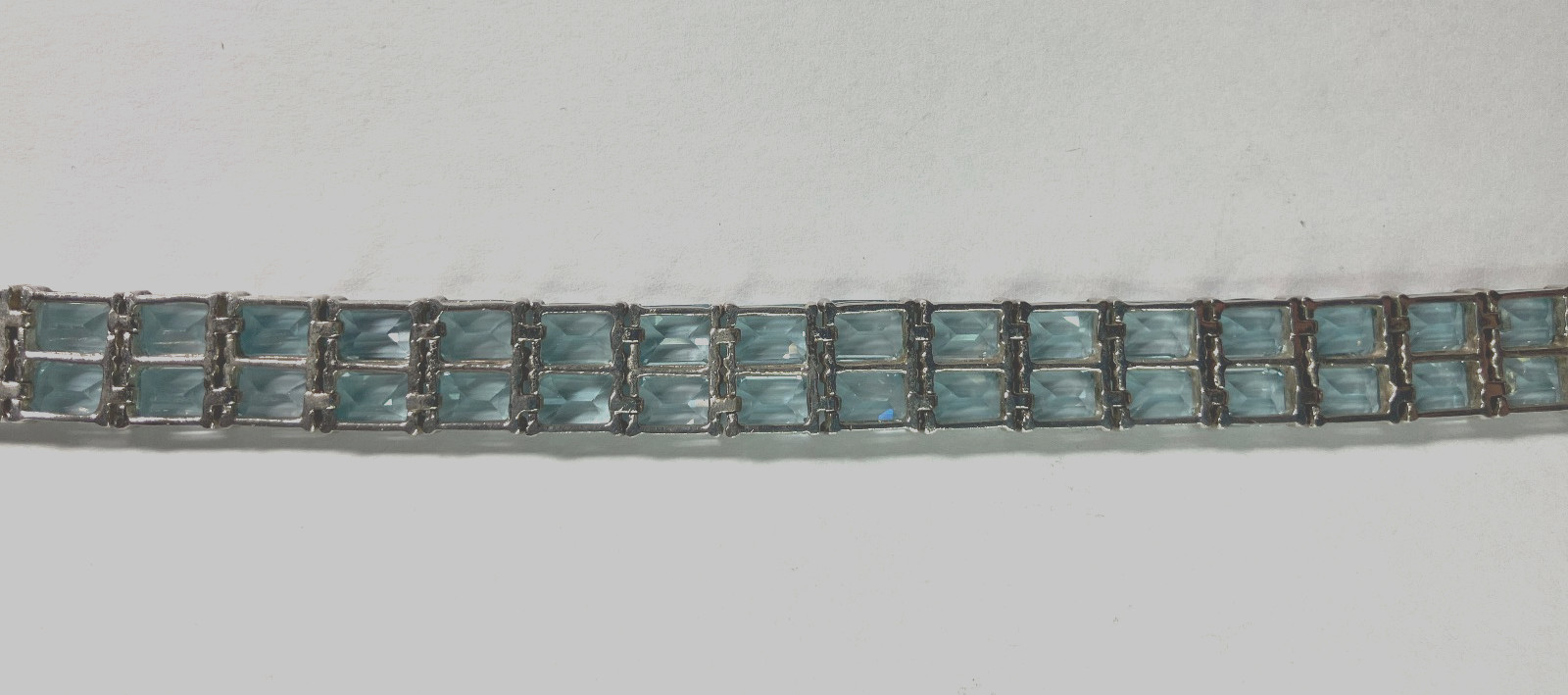8” TENNIS BRACELET -ADI 925 STERLING SILVER – 40 EMERALD CUT TOPAZ STONES -NICE!