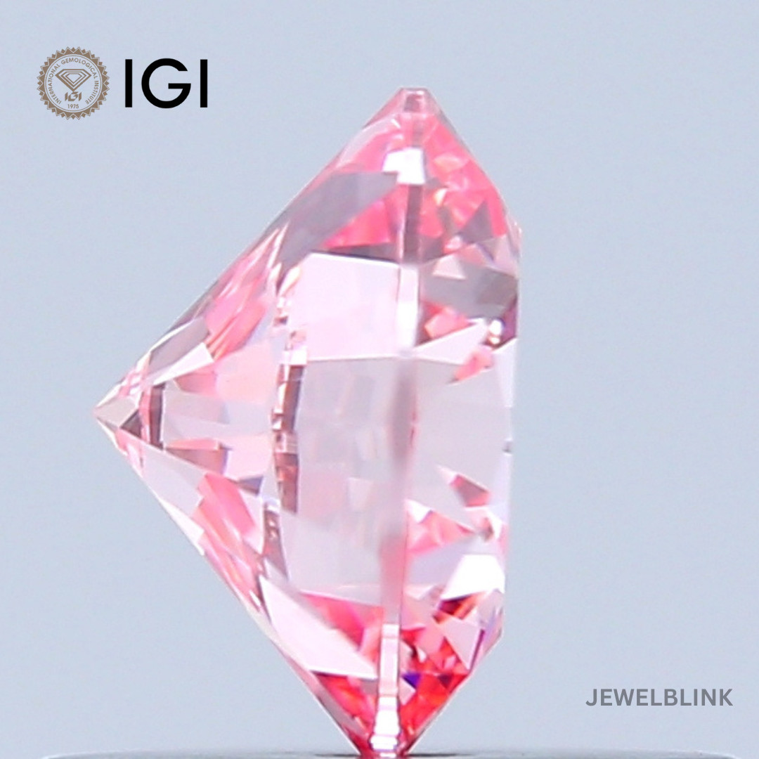 IGI Certified 0.69 Carat Fancy Intense Pink VS1 Round Cut CVD Lab Grown Diamond
