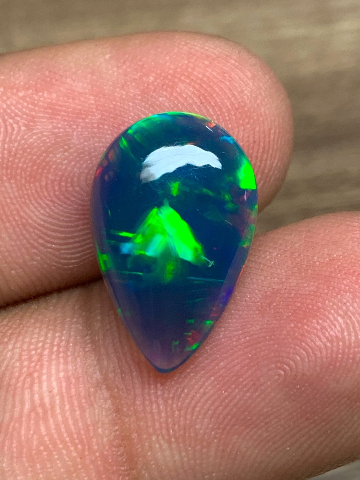 Ethiopian Opal Gemstone 4.65crt Pear Cabochon Black Welo Rainbow Flash Gemstone