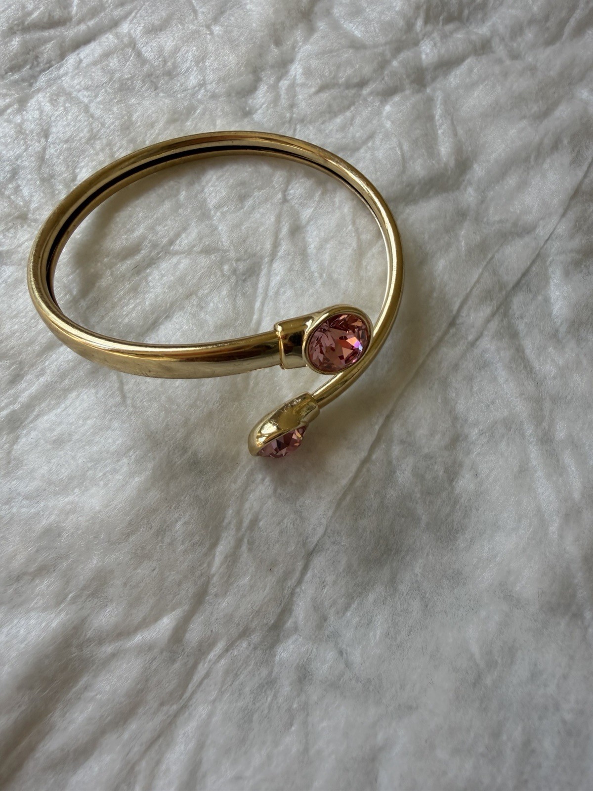 Goldtone Open-Ended Bangle Bracelet with Pink Gemstone Accents