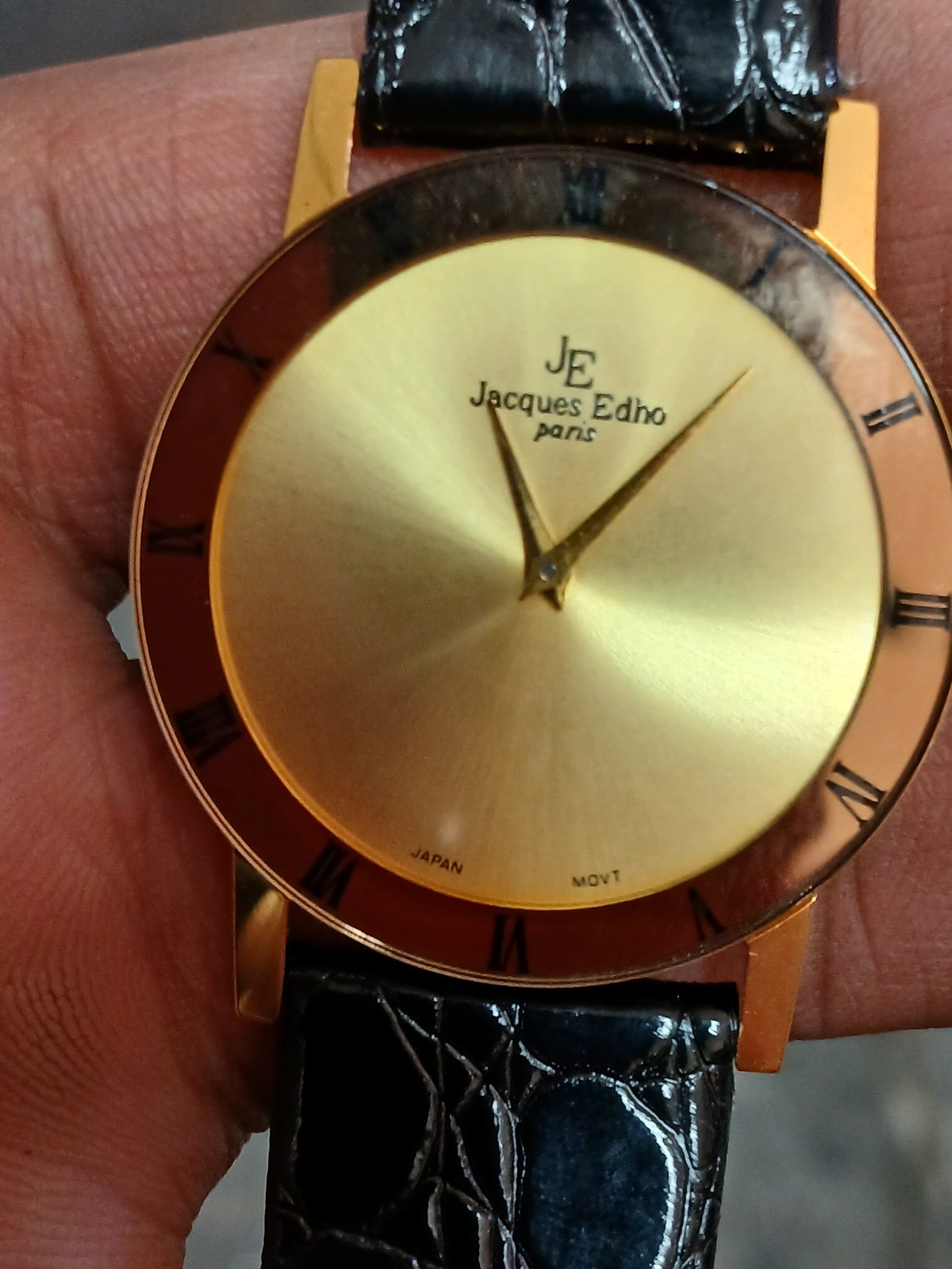 Jacques Edho Paris quartz dress watch featuring an 18k gold-plated case