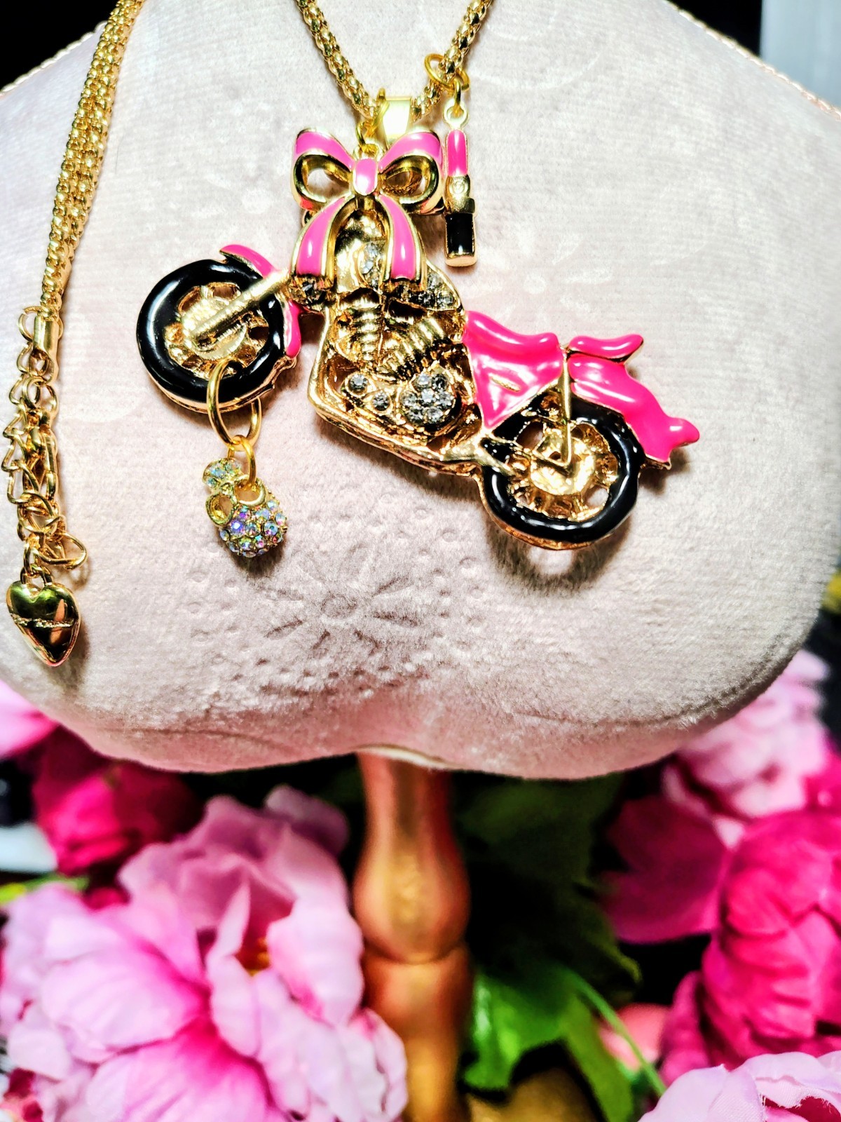 Betsey Johnson Pink Rhinestone motorcycle with BOW, SKULL, And LIPSTICK charms