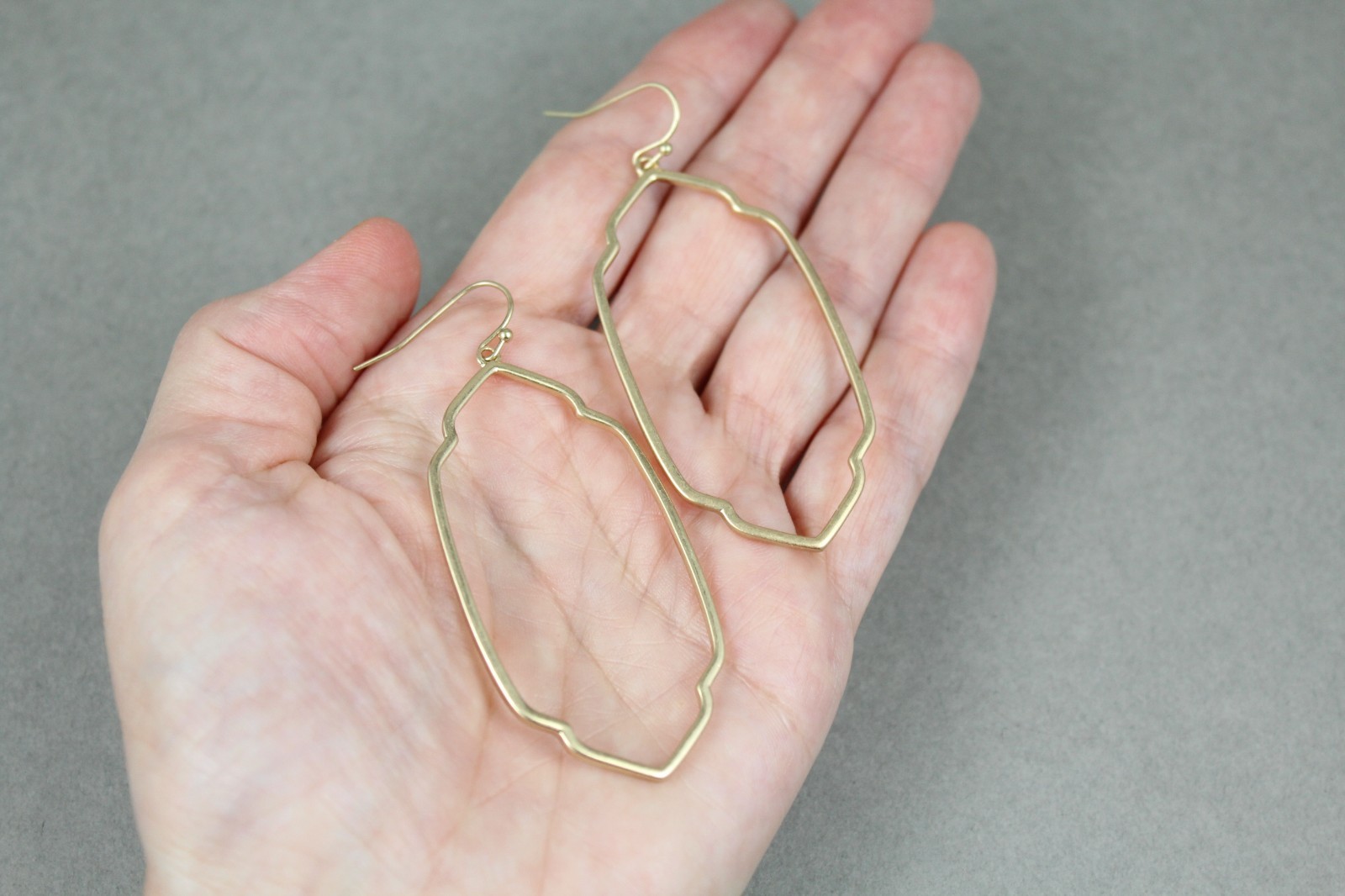 Gold oval teardrop earrings dangle cutout filigree oval outline 2.75″ long