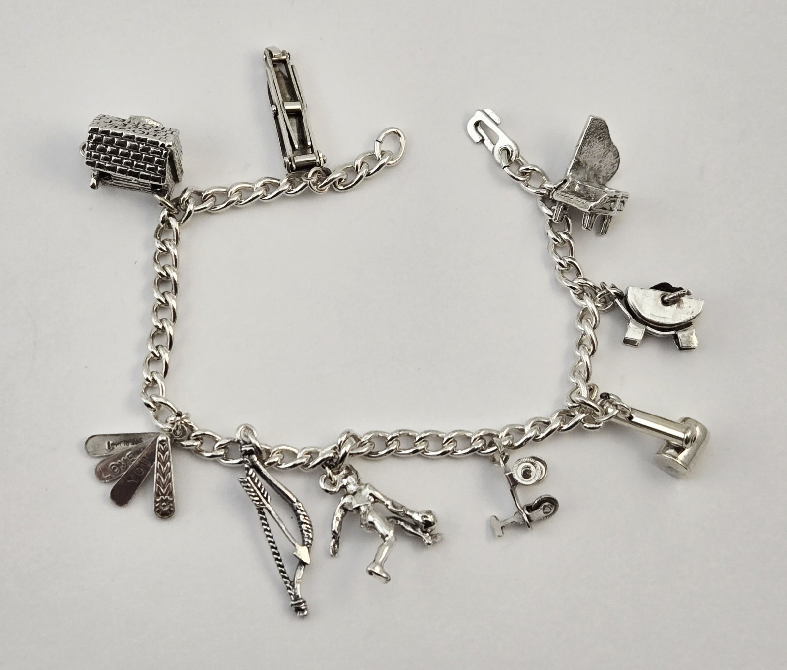 VTG Sterling Silver Charm Bracelet 7″ Piano Baby Carriage Ice Skater Bow Arrow