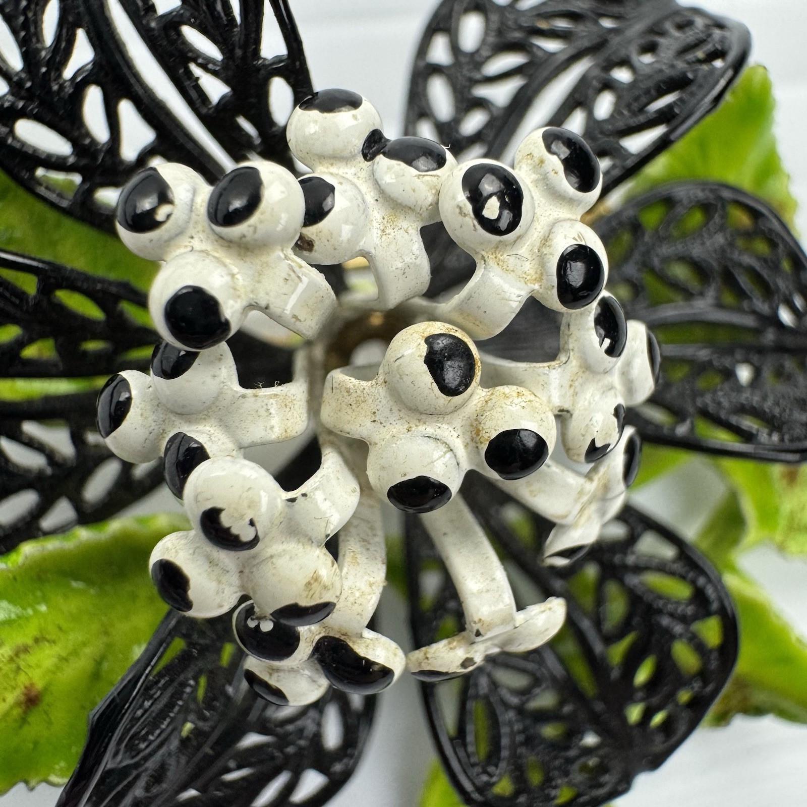 Vintage Enamel Flower Brooch Black White Green Filigree Leaf Statement Pin
